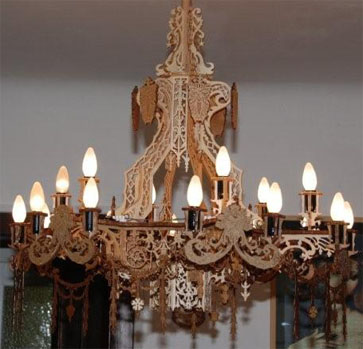 wooden scroll saw fretwork chandelier with grotesques